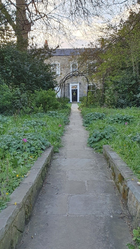 Image of Groves Terrace, looking up the front path to the door.